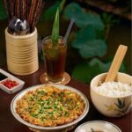Canh gân bò nấu cải  chua
